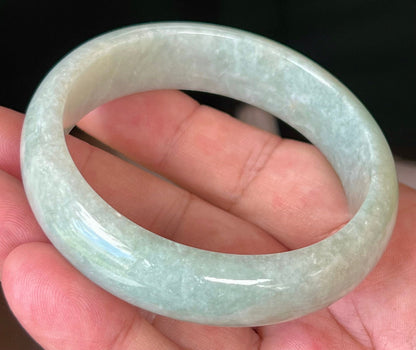 Rounded classic profile of 58.3mm icy green and white Burmese jade bangle JB548