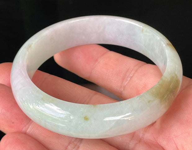 Rounded classic profile of 58.7mm icy milky white, green, and lavender Burmese jade bangle JB226