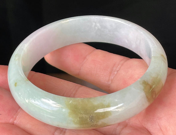 Rounded classic profile of 58.7mm icy milky white, green, and lavender Burmese jade bangle JB226