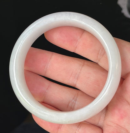Flat inner and round outer edges of 58.5mm icy milky white and honey Burmese jade bangle JB827