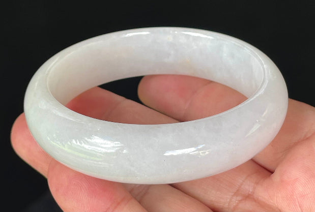 Flat inner and round outer edges of 58.5mm icy milky white and honey Burmese jade bangle JB827