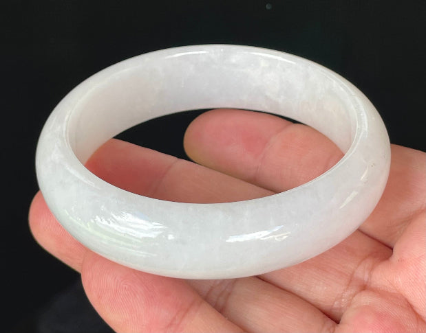 Flat inner and round outer edges of 58.5mm icy milky white and honey Burmese jade bangle JB827