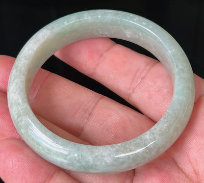Rounded classic profile of 55mm icy green Burmese jade bangle JB518