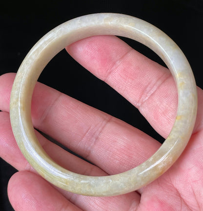 Flat inner and round outer edges of 58.5mm icy yellow, honey orange, and milky white Burmese jade bangle JB923