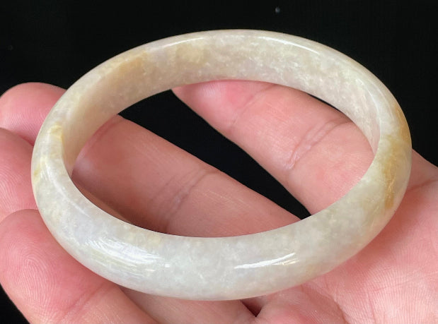 Flat inner and round outer edges of 59.5mm icy yellow, honey, and milky white Burmese jade bangle JB926