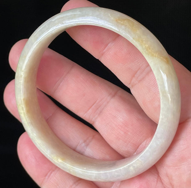 Flat inner and round outer edges of 59.5mm icy yellow, honey, and milky white Burmese jade bangle JB926