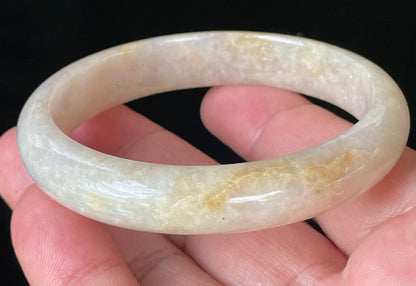 Flat inner and round outer edges of 59.5mm icy yellow, honey, and milky white Burmese jade bangle JB926