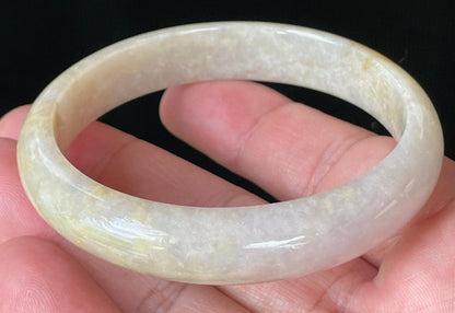 Flat inner and round outer edges of 59.5mm icy yellow, honey, and milky white Burmese jade bangle JB926