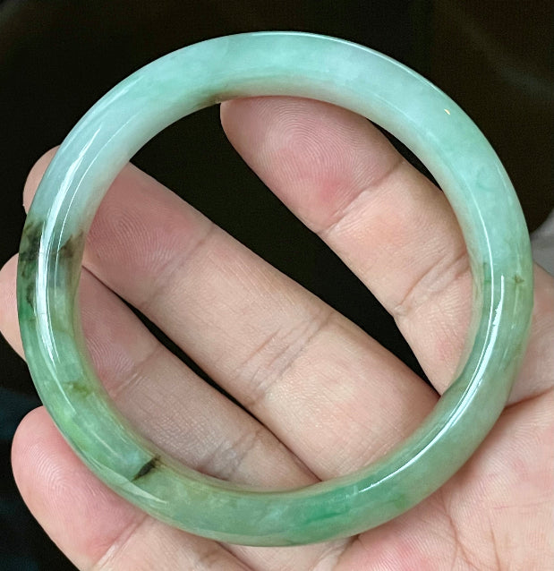 Flat inner and round outer edges of 58.6mm bluish white, green, and honey Burmese jade bangle JB120