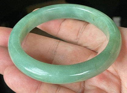 Flat inner and round outer edges of 58.5mm icy apple and imperial green Burmese jade bangle JB922