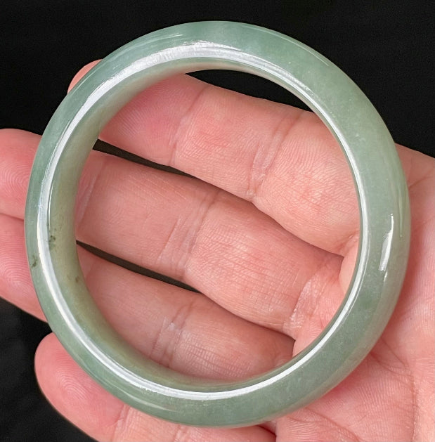 Flat inner and round outer edges of 58.5mm icy apple and imperial green Burmese jade bangle JB922