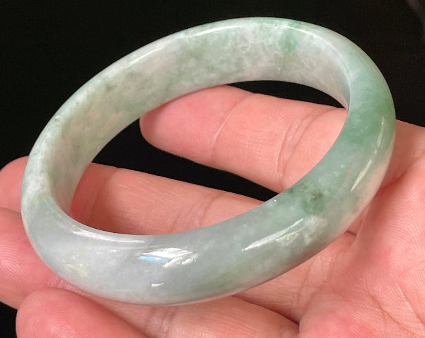 Flat inner and round outer edges of 58mm icy imperial green and greyish white Burmese jade bangle JB004