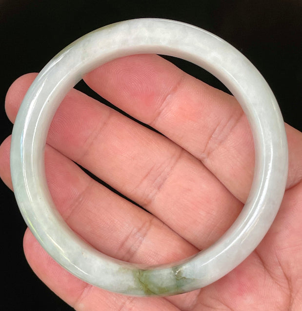 Flat inner and round outer edges of 57.5mm icy apple, moss green, and greyish white Burmese jade bangle JB025