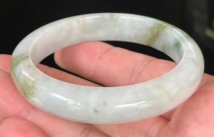 Flat inner and round outer edges of 57.5mm icy apple, moss green, and greyish white Burmese jade bangle JB025