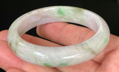 Flat inner and round outer edges of 54.5mm icy imperial green, moss green, and greyish white Burmese jade bangle JB031