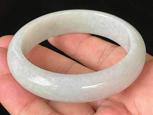 Flat inner and round outer edges of 55.5mm icy light apple green and milky white Burmese jade bangle JB900