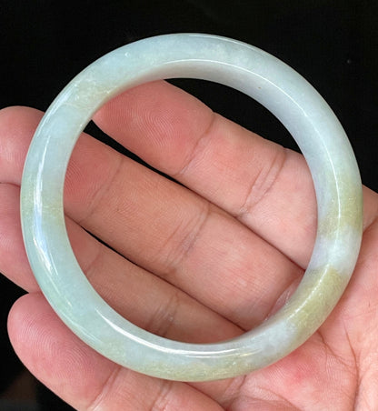 Flat inner and round outer edges of 57mm icy apple green, lavender, and milky white Burmese jade bangle JB912