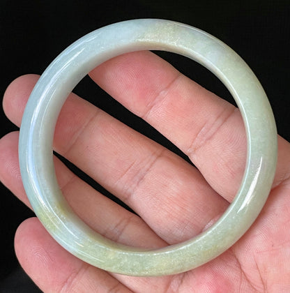 Flat inner and round outer edges of 57mm icy apple green, lavender, and milky white Burmese jade bangle JB912