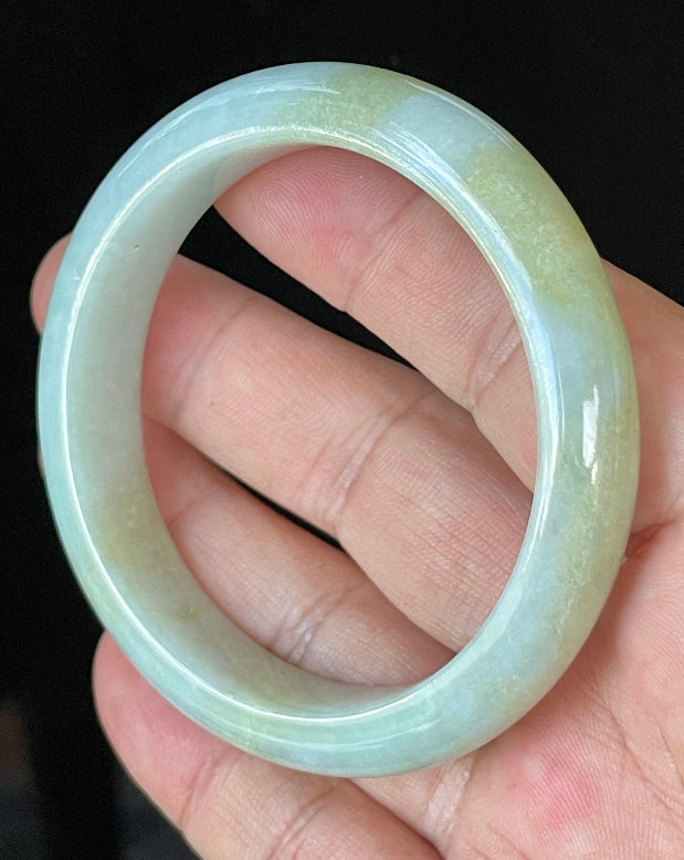 Flat inner and round outer edges of 57mm icy apple green, lavender, and milky white Burmese jade bangle JB912