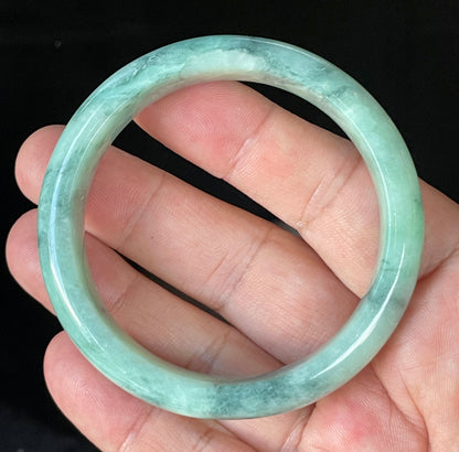 Flat inner and round outer edges of 56mm icy imperial, apple green, and milky white Burmese jade bangle JB914