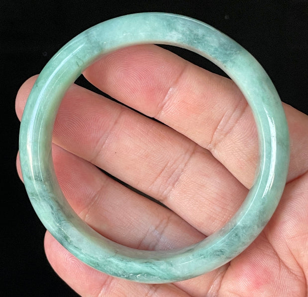 Flat inner and round outer edges of 56mm icy imperial, apple green, and milky white Burmese jade bangle JB914