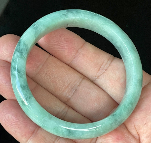 Flat inner and round outer edges of 56mm icy imperial, apple green, and milky white Burmese jade bangle JB914