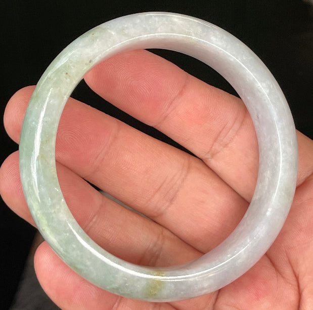 Flat inner and round outer edges of 58.3mm icy lavender, white, and green Burmese jade bangle JB054