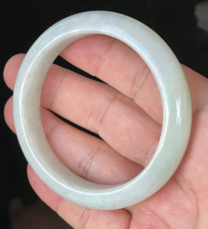 Flat inner and round outer edges of 58.5mm icy greyish white and apple green Burmese jade bangle JB910