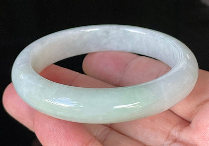 Flat inner and round outer edges of 58.5mm icy greyish white and apple green Burmese jade bangle JB910