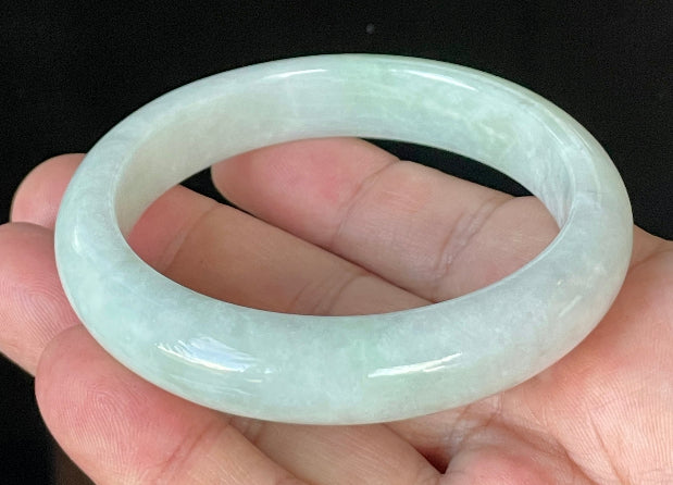 Flat inner and round outer edges of 58.5mm icy greyish white and apple green Burmese jade bangle JB910