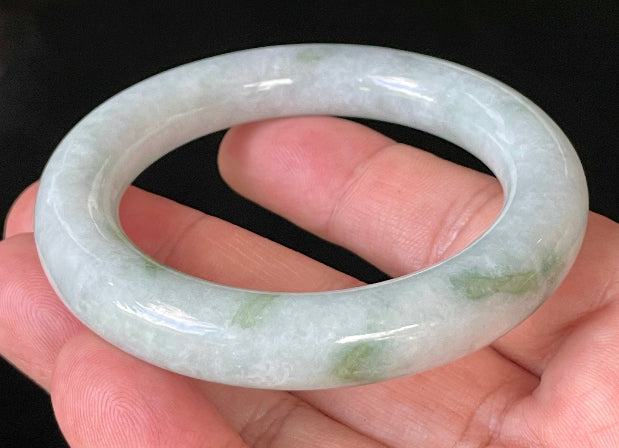 Rounded inner and outer edges of 52mm icy white, grey, and green Burmese jade bangle JB913
