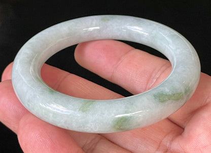 Rounded inner and outer edges of 52mm icy white, grey, and green Burmese jade bangle JB913