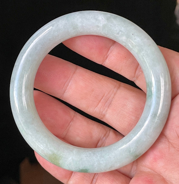 Rounded inner and outer edges of 52mm icy white, grey, and green Burmese jade bangle JB913