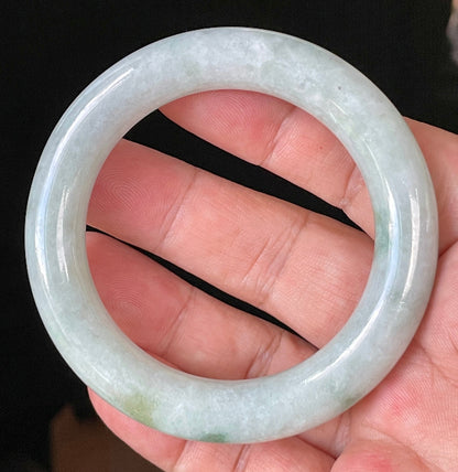 Rounded inner and outer edges of 52mm icy white, grey, and green Burmese jade bangle JB913