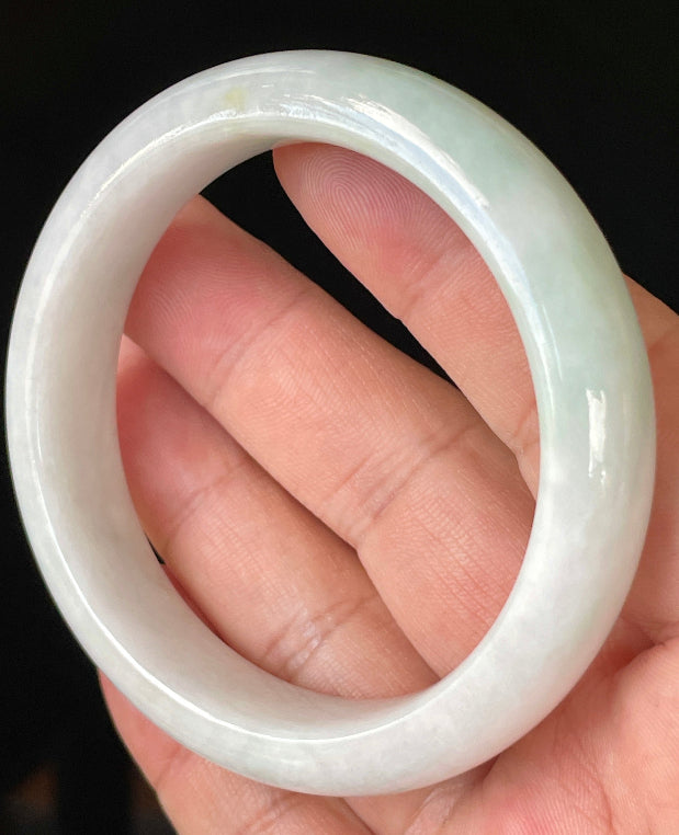 Flat inner and round outer edges of 57.5mm icy milky white and apple green Burmese jade bangle JB921