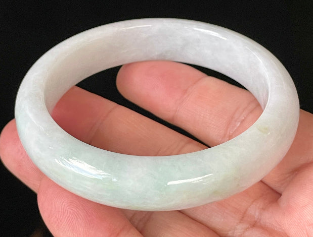 Flat inner and round outer edges of 57.5mm icy milky white and apple green Burmese jade bangle JB921