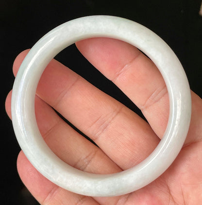 Flat inner and round outer edges of 57.5mm icy milky white and apple green Burmese jade bangle JB921
