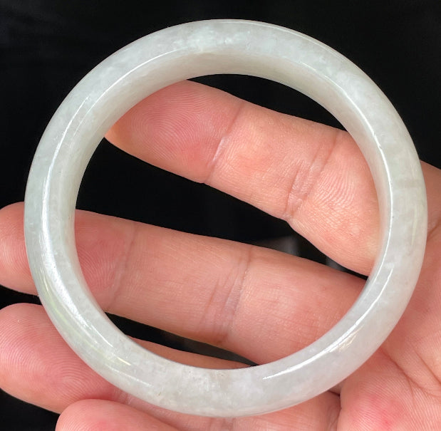 Flat inner and round outer edges of 56.7mm icy apple green and white Burmese jade bangle JB103