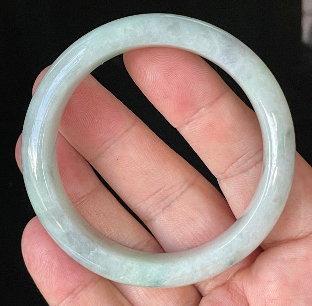 Flat inner and round outer edges of 55.2mm icy apple green and greyish white Burmese jade bangle JB920