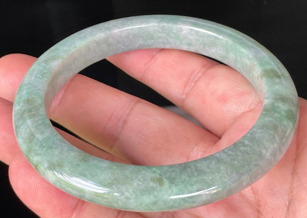 Flat inner and round outer edges of 66mm icy greyish apple and imperial green Burmese jade bangle JB223