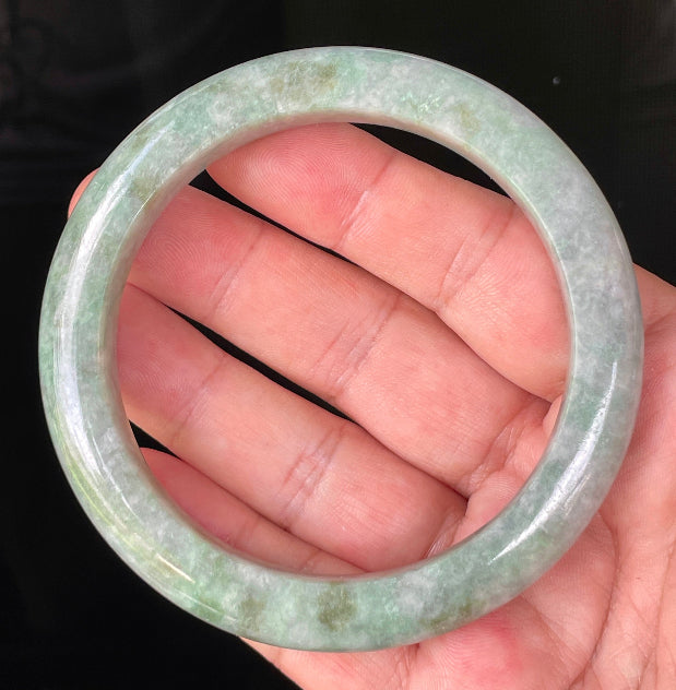Flat inner and round outer edges of 66mm icy greyish apple and imperial green Burmese jade bangle JB223