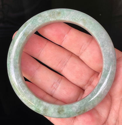Flat inner and round outer edges of 66mm icy greyish apple and imperial green Burmese jade bangle JB223