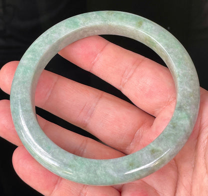 Flat inner and round outer edges of 66mm icy greyish apple and imperial green Burmese jade bangle JB223