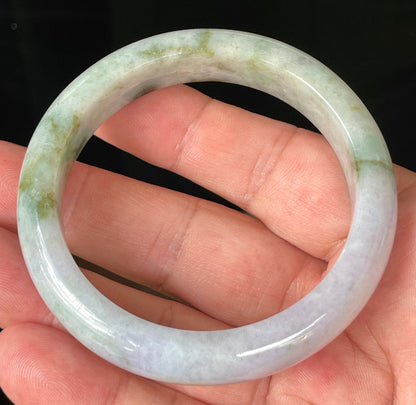 Flat inner and round outer edges of 56.7mm icy imperial green, white, and lavender Burmese jade bangle JB216