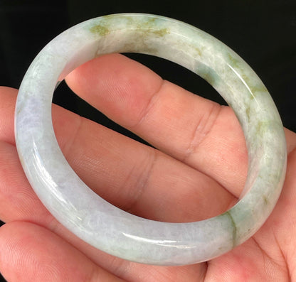 Flat inner and round outer edges of 56.7mm icy imperial green, white, and lavender Burmese jade bangle JB216