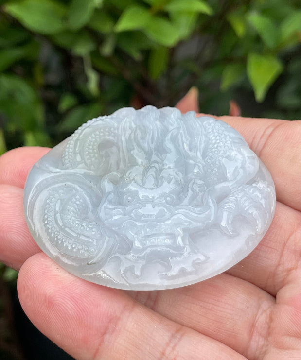 Fine texture of the authentic Myanmar jade pendant JP051 showcasing a traditional Dragon Feng Shui design for protection and resilience