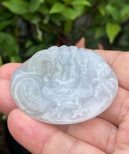 Fine texture of the authentic Myanmar jade pendant JP051 showcasing a traditional Dragon Feng Shui design for protection and resilience