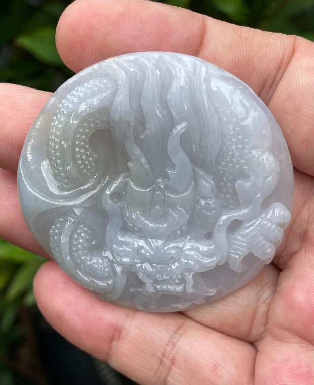 Fine texture of the authentic Myanmar jade pendant JP051 showcasing a traditional Dragon Feng Shui design for protection and resilience
