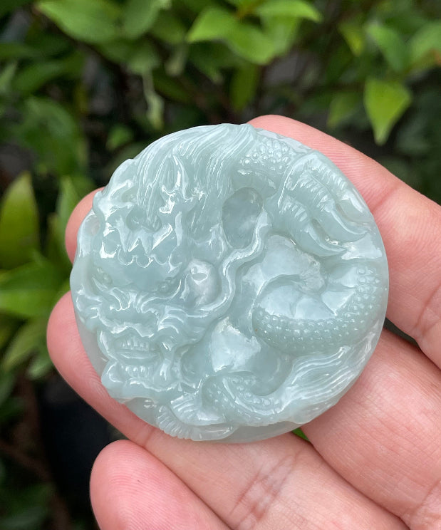 Fine texture of the authentic Myanmar jade pendant JP052 showcasing a traditional Dragon Feng Shui design for protection and prosperity