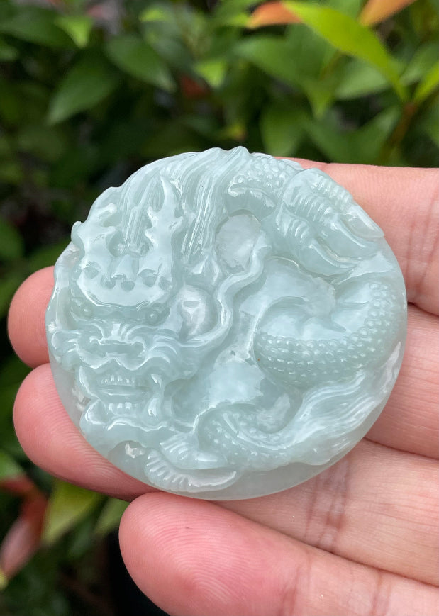 Fine texture of the authentic Myanmar jade pendant JP052 showcasing a traditional Dragon Feng Shui design for protection and prosperity